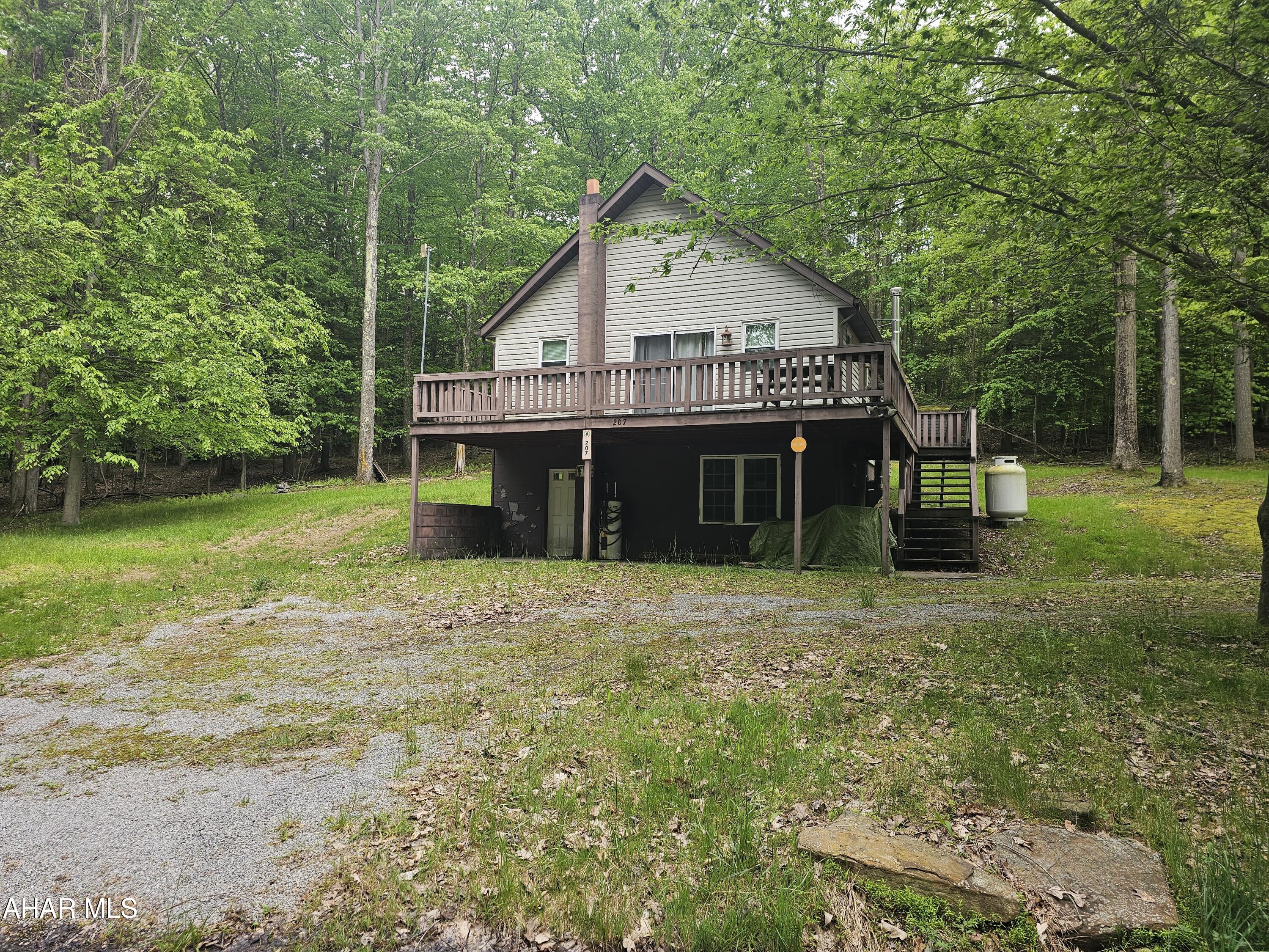 207 Kendrick Lane Flinton, PA 16640 - Photo 1 of 30 a view of a house with a yard and sitting area