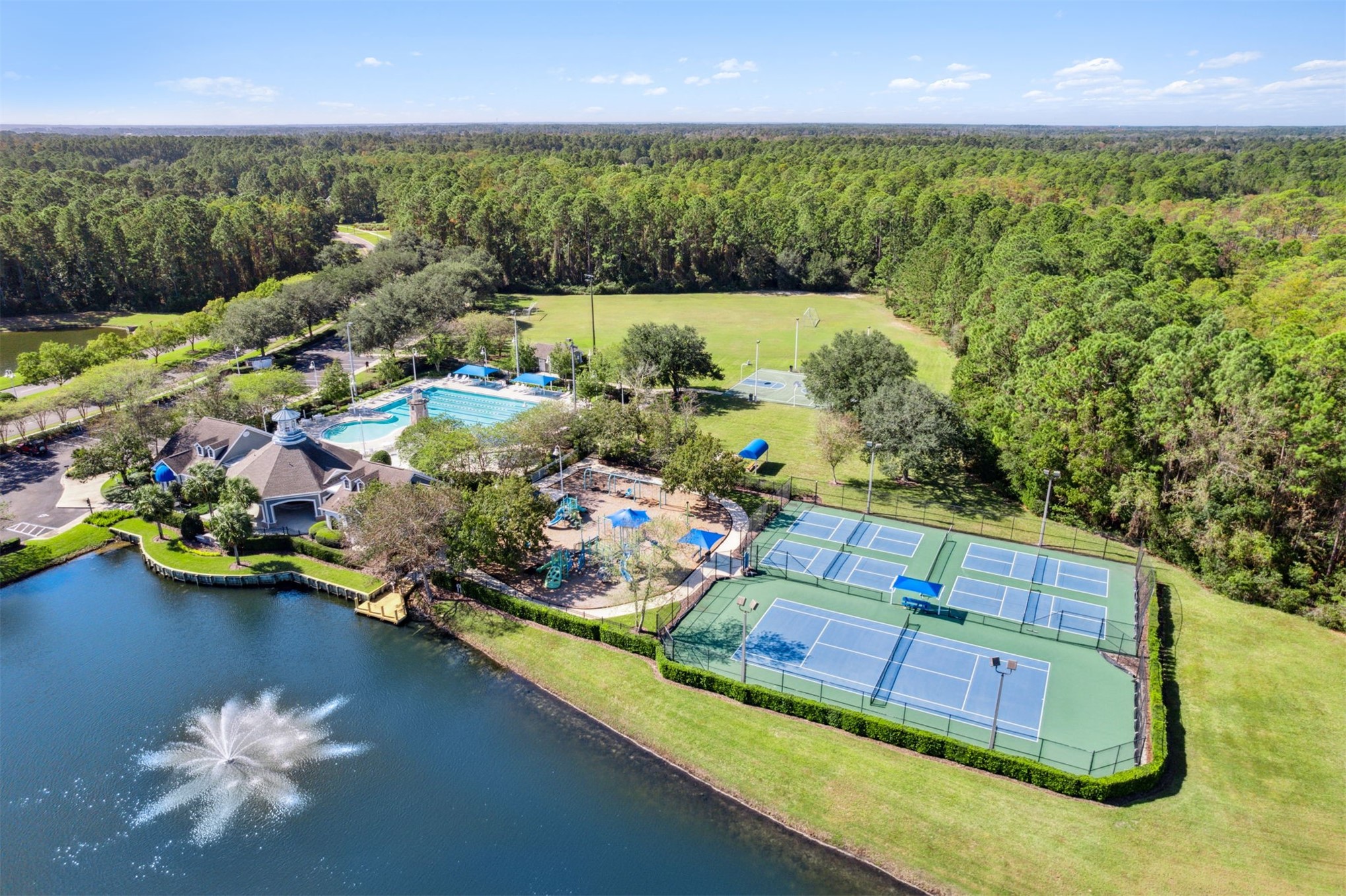 86107 Remsenburg Drive Fernandina Beach, FL 32034 - Photo 36 of 58 a view of a lake with a house