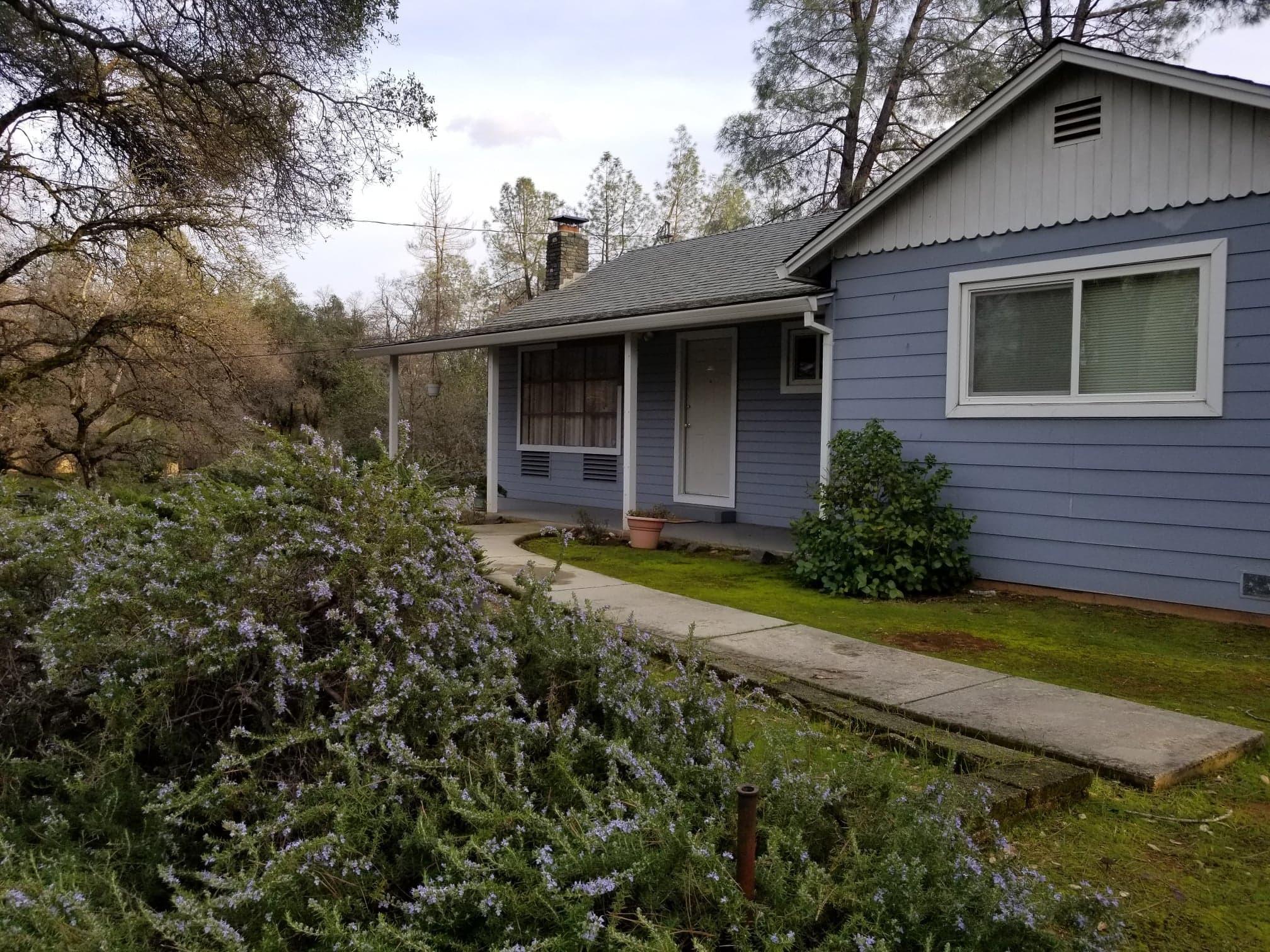3083 Keswick Dam Road Redding, CA 96003 - Photo 2 of 19 a view of a house with a yard