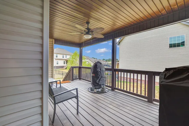 a view of a balcony with chairs