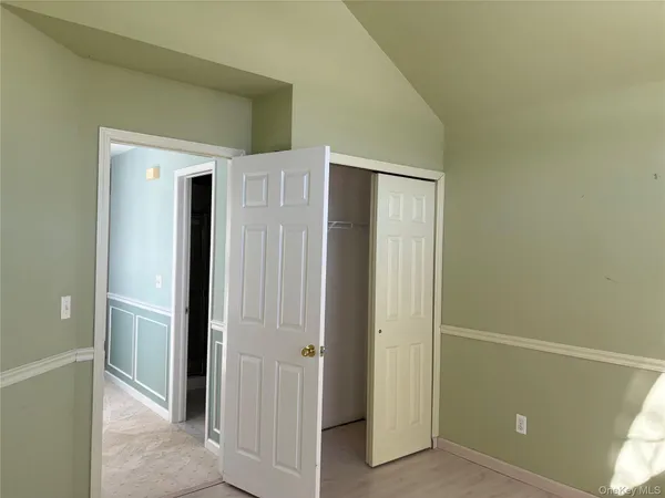 a view of a hallway with elevator