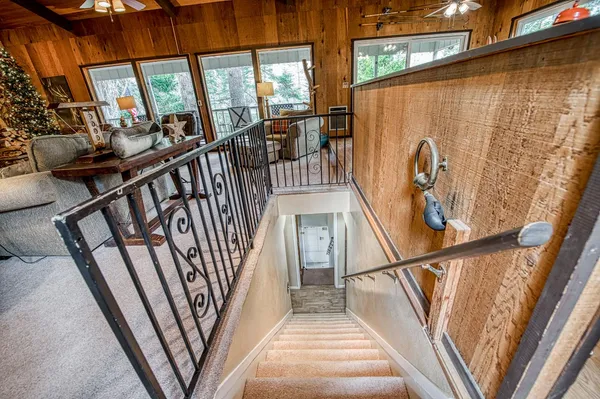 a view of staircase with white walls