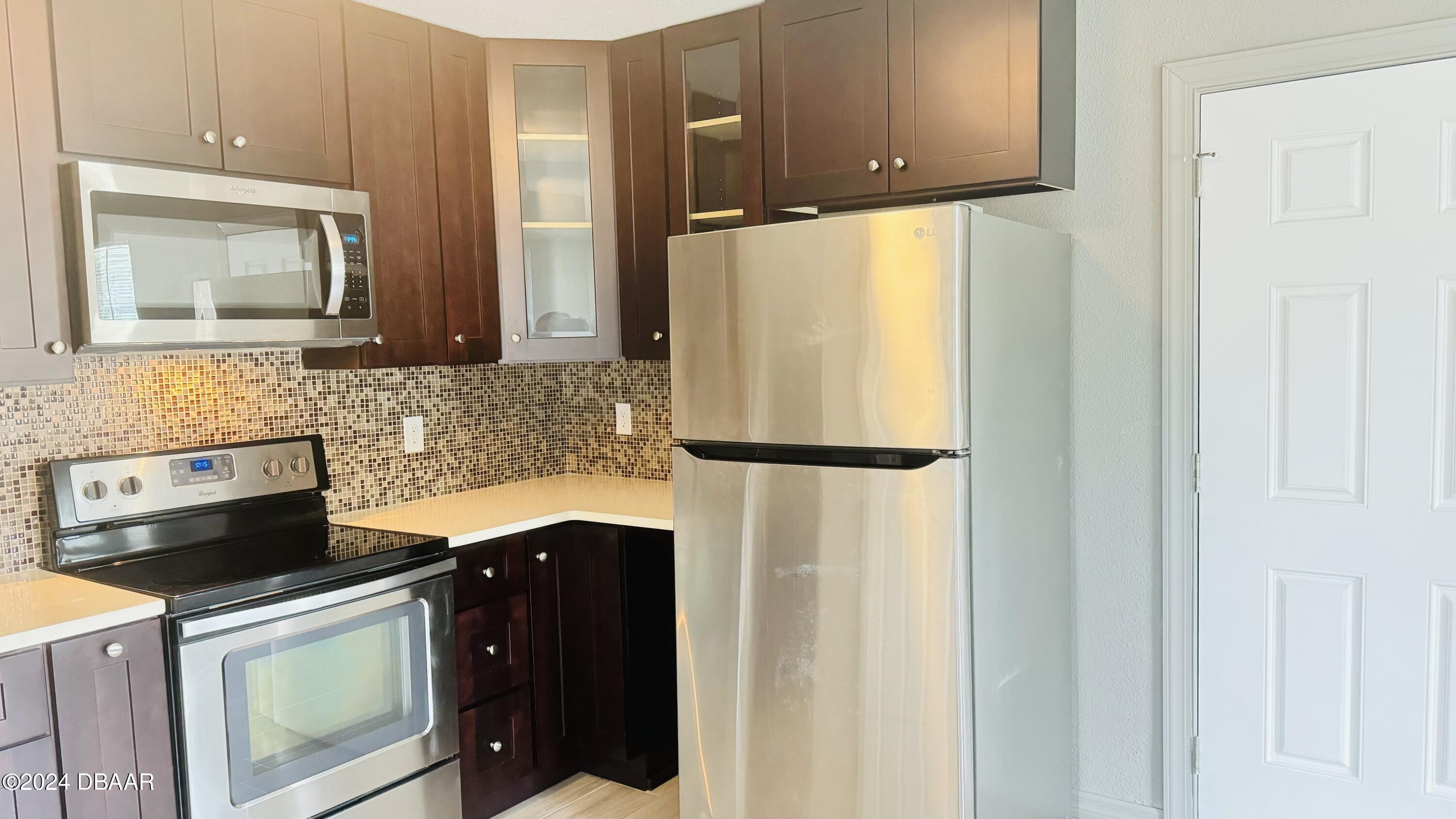 71 Rockefeller Drive, Unit A Ormond Beach, FL 32176 - Photo 8 of 21 IMG_1043