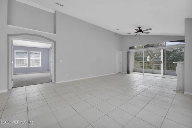 an empty room with windows