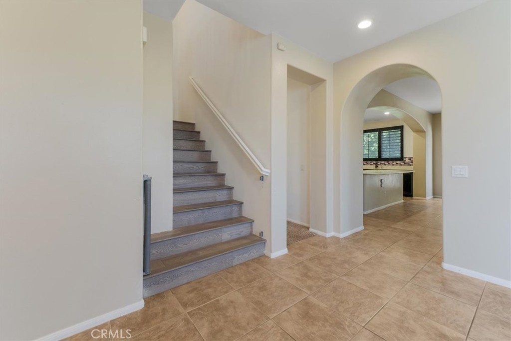 40530 Amador Drive Indio, CA 92203 - Photo 14 of 59 a view of a hallway view with wooden floor and staircase