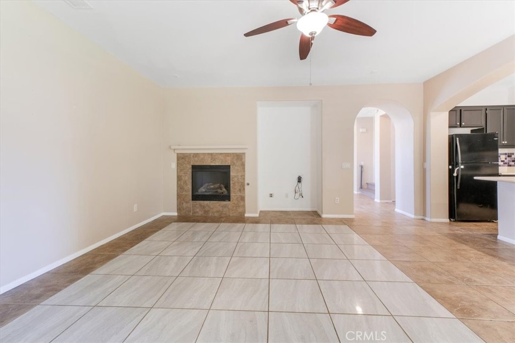 40530 Amador Drive Indio, CA 92203 - Photo 18 of 59 a view of an empty room with a fireplace