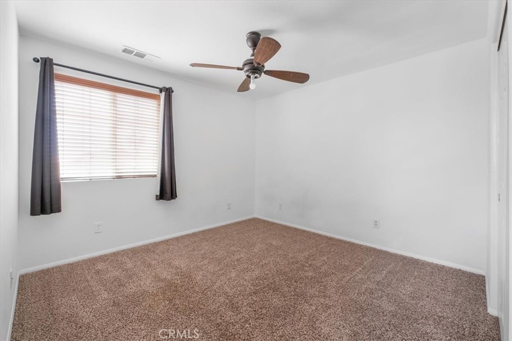 40530 Amador Drive Indio, CA 92203 - Photo 41 of 59 an empty room with a window