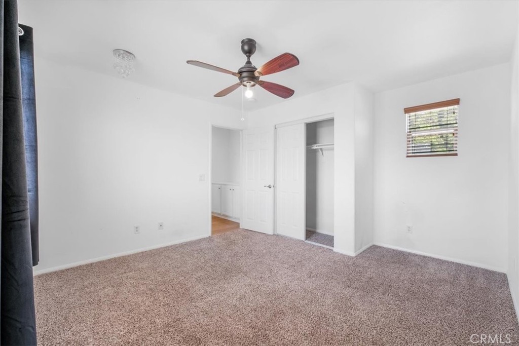40530 Amador Drive Indio, CA 92203 - Photo 45 of 59 a view of a room with a ceiling fan and window