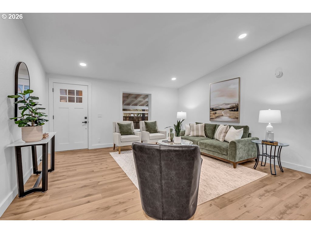 241 Northwest Wade Street Estacada, OR 97023 - Photo 12 of 45 a living room with furniture and a wooden floor