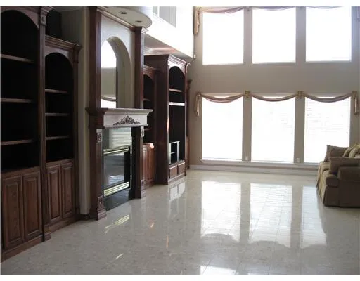 a view of living room with furniture and a window