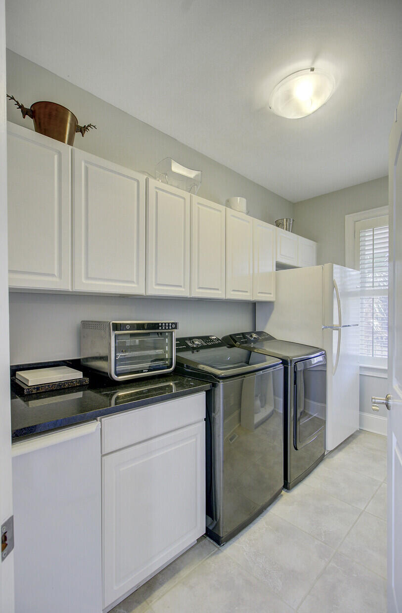 1888 North James Gregarie Road Mount Pleasant, SC 29466 - Photo 34 of 81 Walk-in Laundry & Utility Room