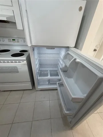 a view of a car parked in front of a building