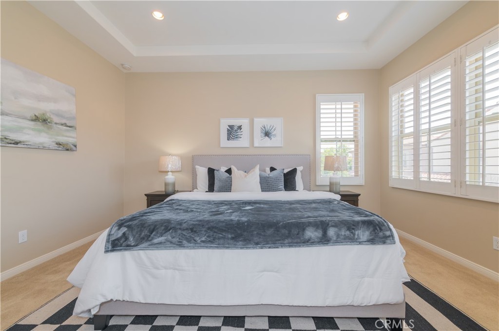 93 Rembrandt Irvine, CA 92620 - Photo 13 of 26 a bedroom with a bed and windows