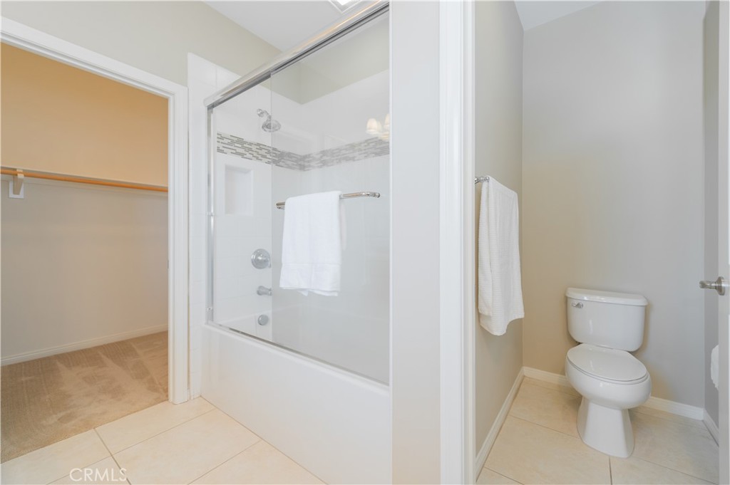 93 Rembrandt Irvine, CA 92620 - Photo 19 of 26 a bathroom with a shower and a toilet