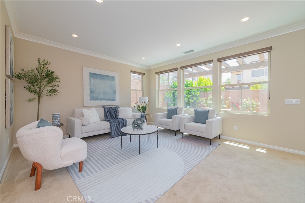 93 Rembrandt Irvine, CA 92620 - Photo 3 of 26 a living room with furniture and a large window