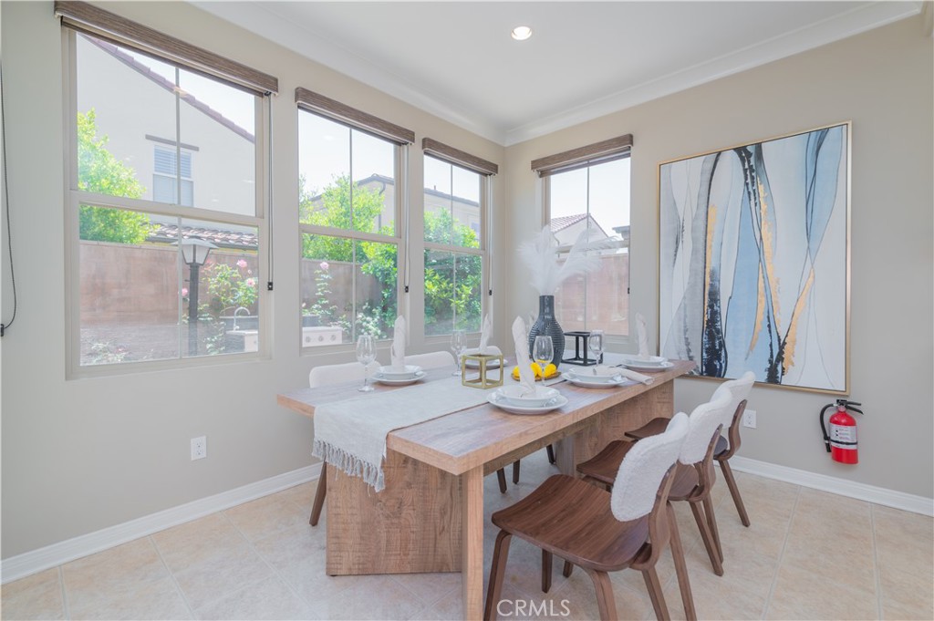 93 Rembrandt Irvine, CA 92620 - Photo 10 of 26 a view of a dining room with furniture and a window