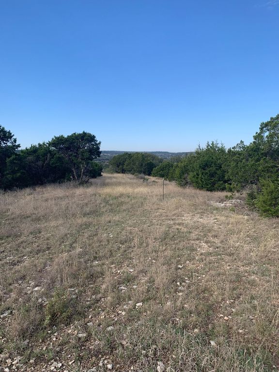 16350 Cedar Valley Road Killeen, TX 76542 - Photo 26 of 31 a view of lake with mountain in background