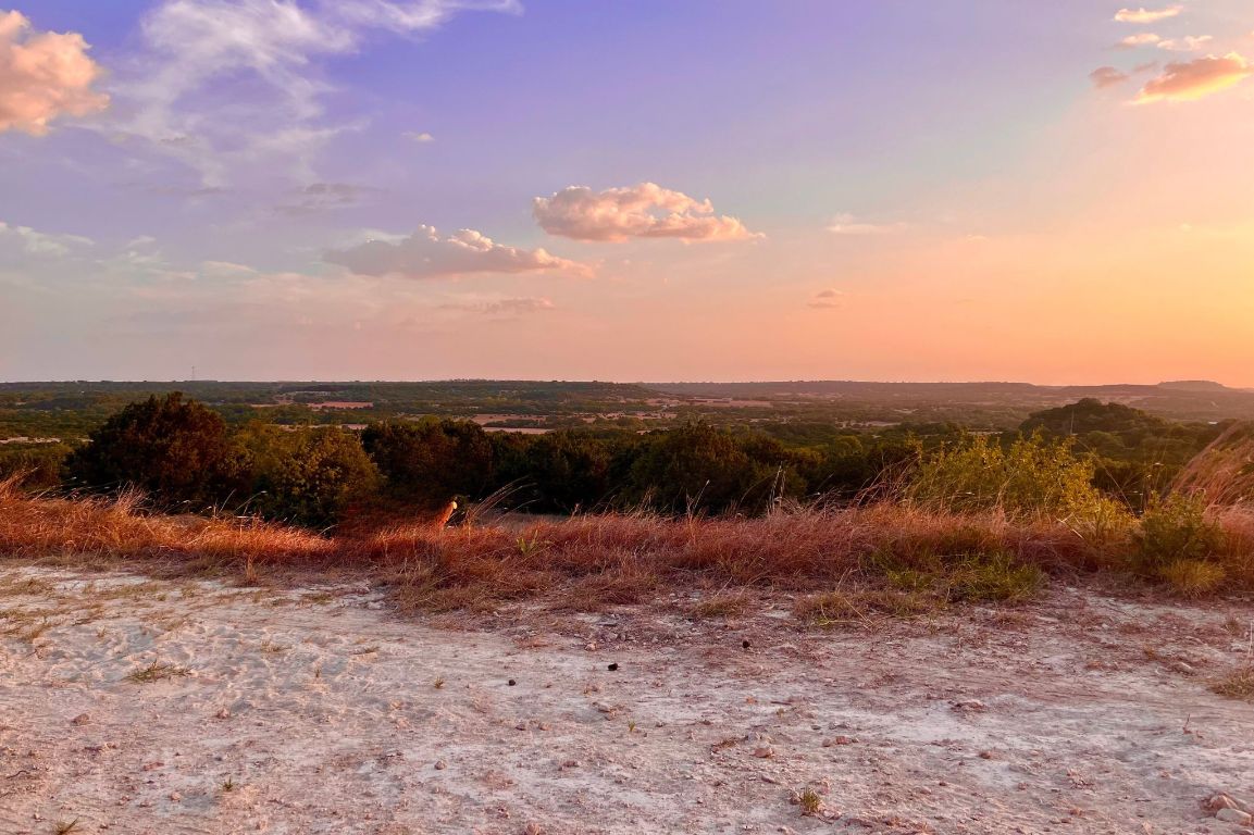 16350 Cedar Valley Road Killeen, TX 76542 - Photo 3 of 31 a view of a lake with mountains in the background