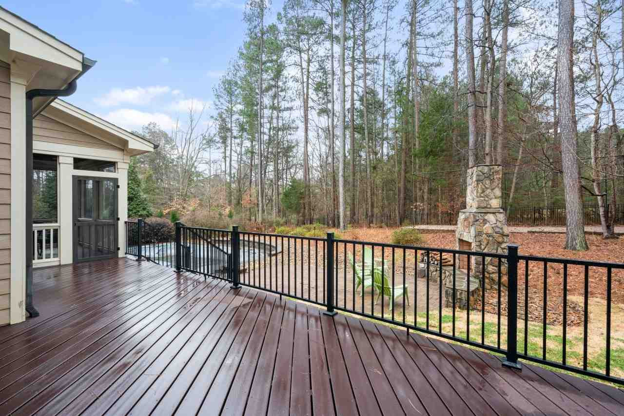 6017 Reedy Creek Road Raleigh, NC 27607 - Photo 29 of 30 Trex decking. Oversized and private. Perfect for entertaining and relaxing. Oversized Deck
