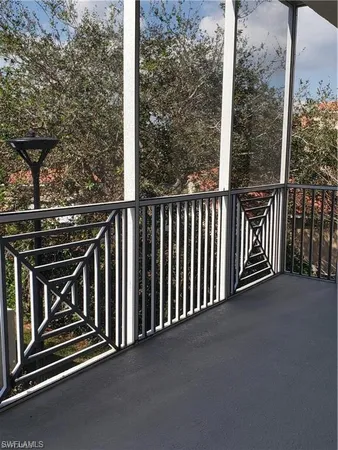 a view of a building from a balcony
