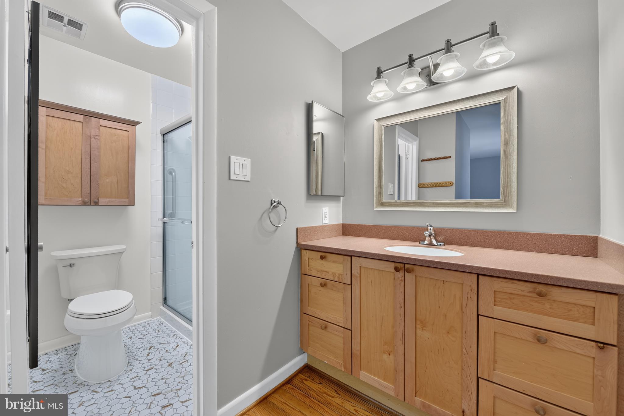 2031 Sarazen Place Reston, VA 20191 - Photo 15 of 27 Primary Bathroom - New Flooring