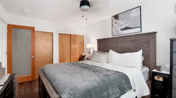 a bathroom with a sink vanity granite shower and a mirror