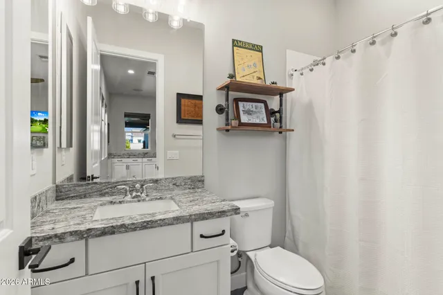 a view of an entrance to house with yard