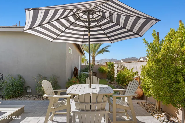 an aerial view of a house with a swimming pool