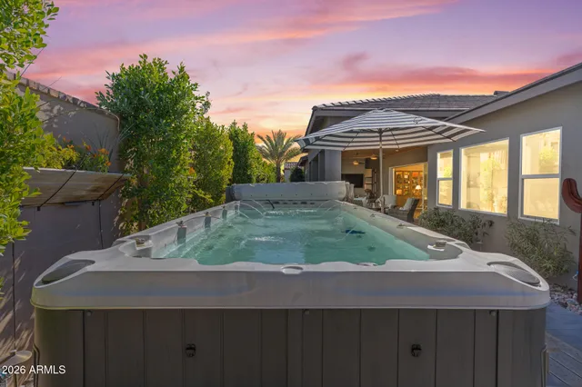 a view of outdoor space with seating area and swimming pool