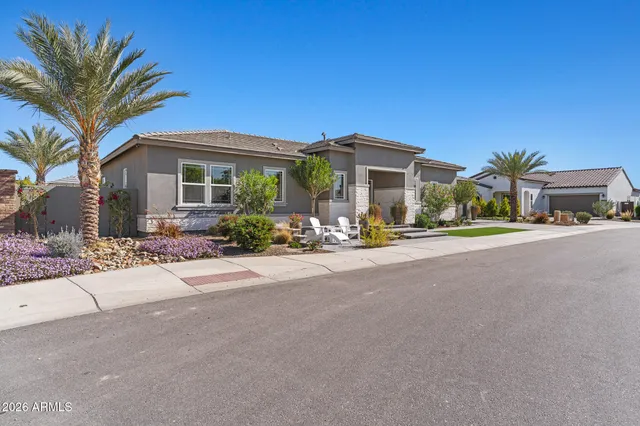 a living room with fireplace furniture and a flat screen tv