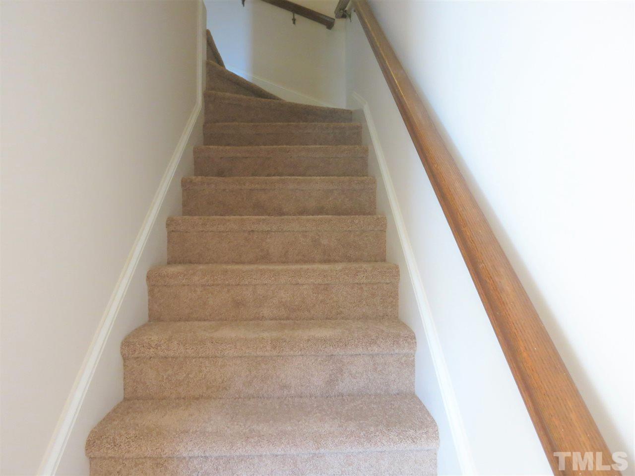 509 Brent Road Raleigh, NC 27606 - Photo 7 of 9 a view of staircase with white walls