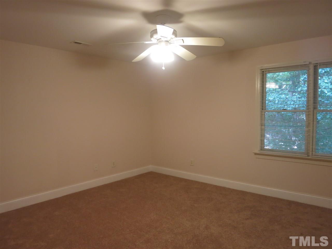 509 Brent Road Raleigh, NC 27606 - Photo 8 of 9 an empty room with a window