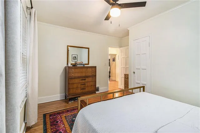 a bedroom with a bed and furniture