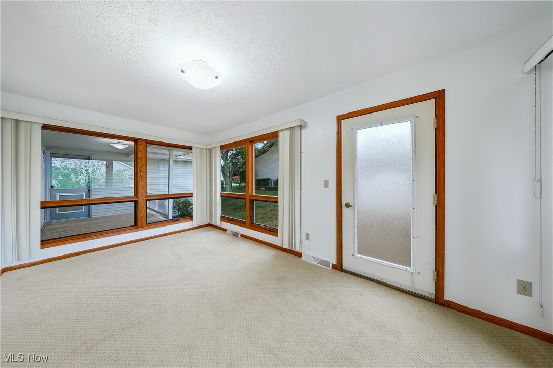 425 Overlook Drive Rittman, OH 44270 - Photo 25 of 44 Carpeted empty room featuring baseboards and a textured ceiling