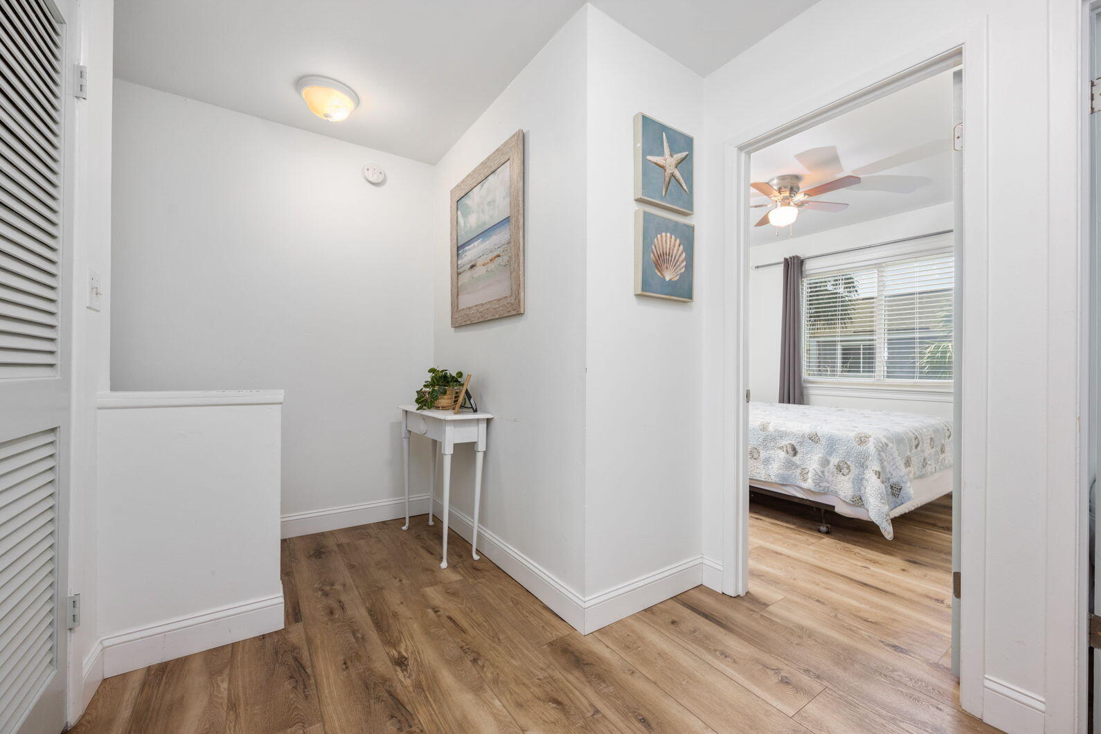 940 Highway 98, Unit 31 Destin, FL 32541 - Photo 17 of 36 a view of a bedroom with wooden floor and a bedroom