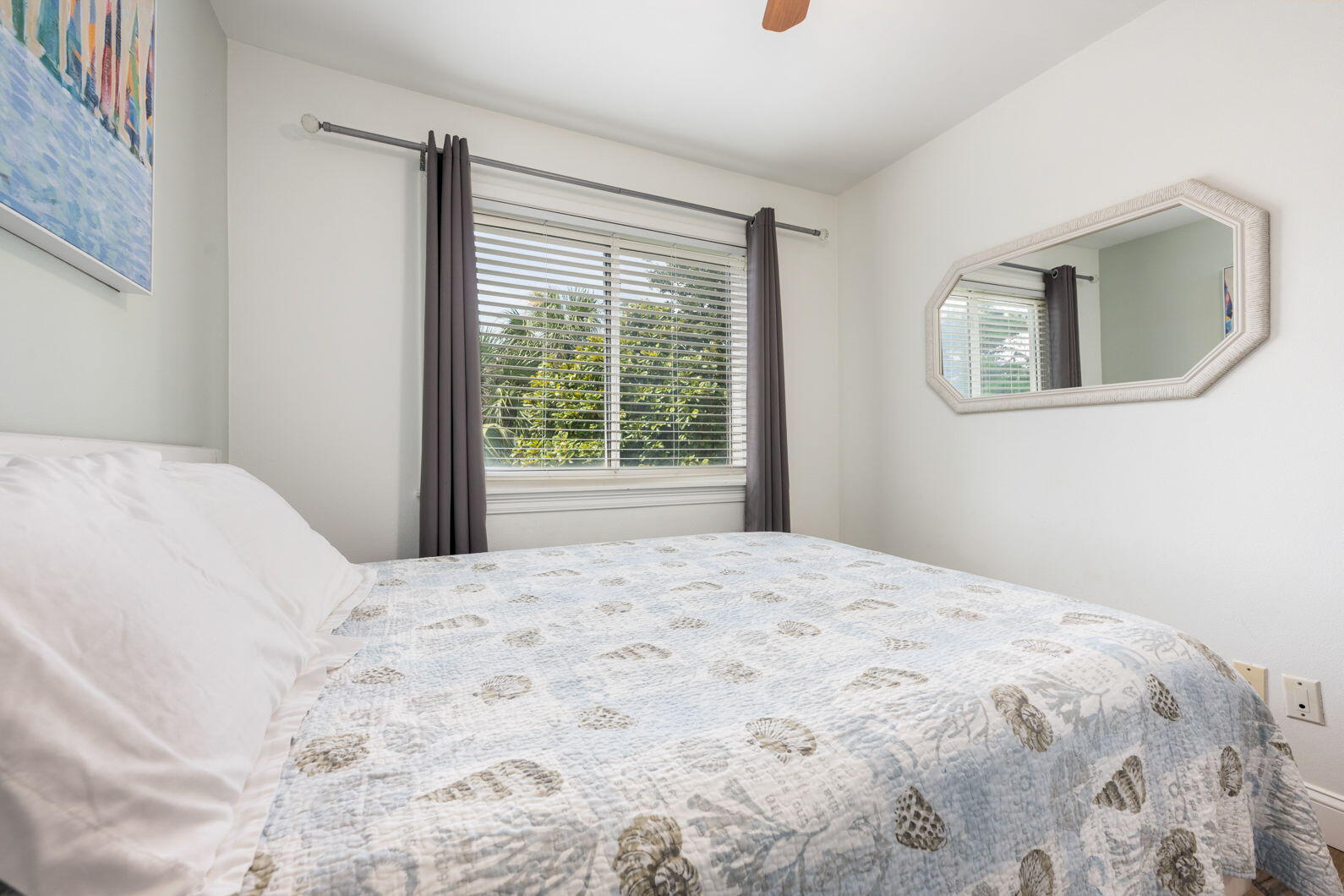 940 Highway 98, Unit 31 Destin, FL 32541 - Photo 27 of 36 a bedroom with a bed and a window