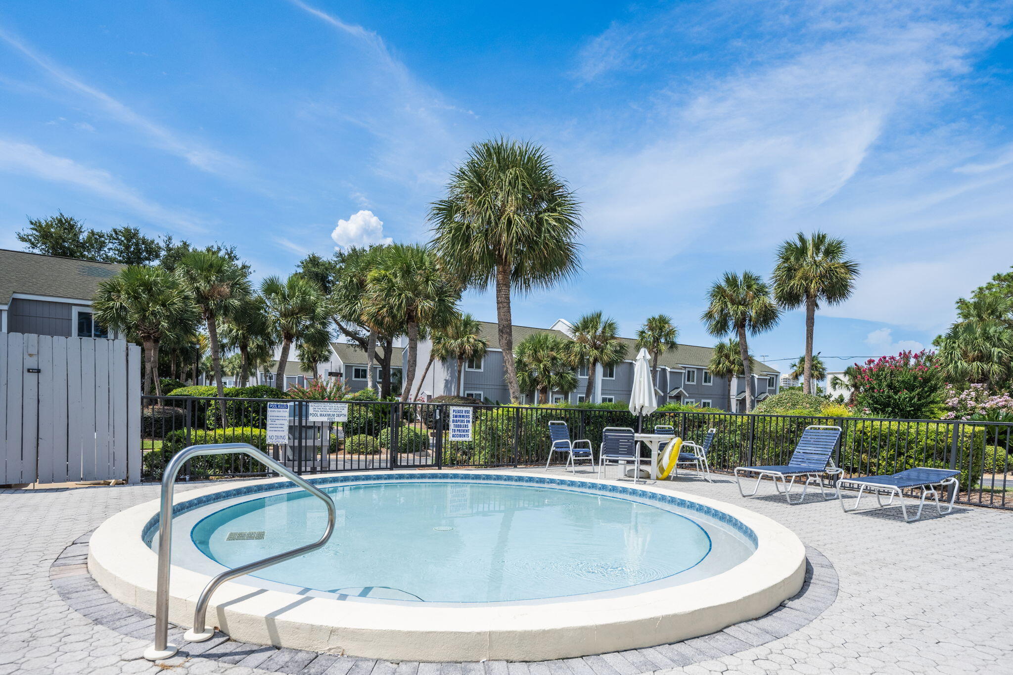 940 Highway 98, Unit 31 Destin, FL 32541 - Photo 30 of 36 a view of swimming pool with outdoor seating and plants