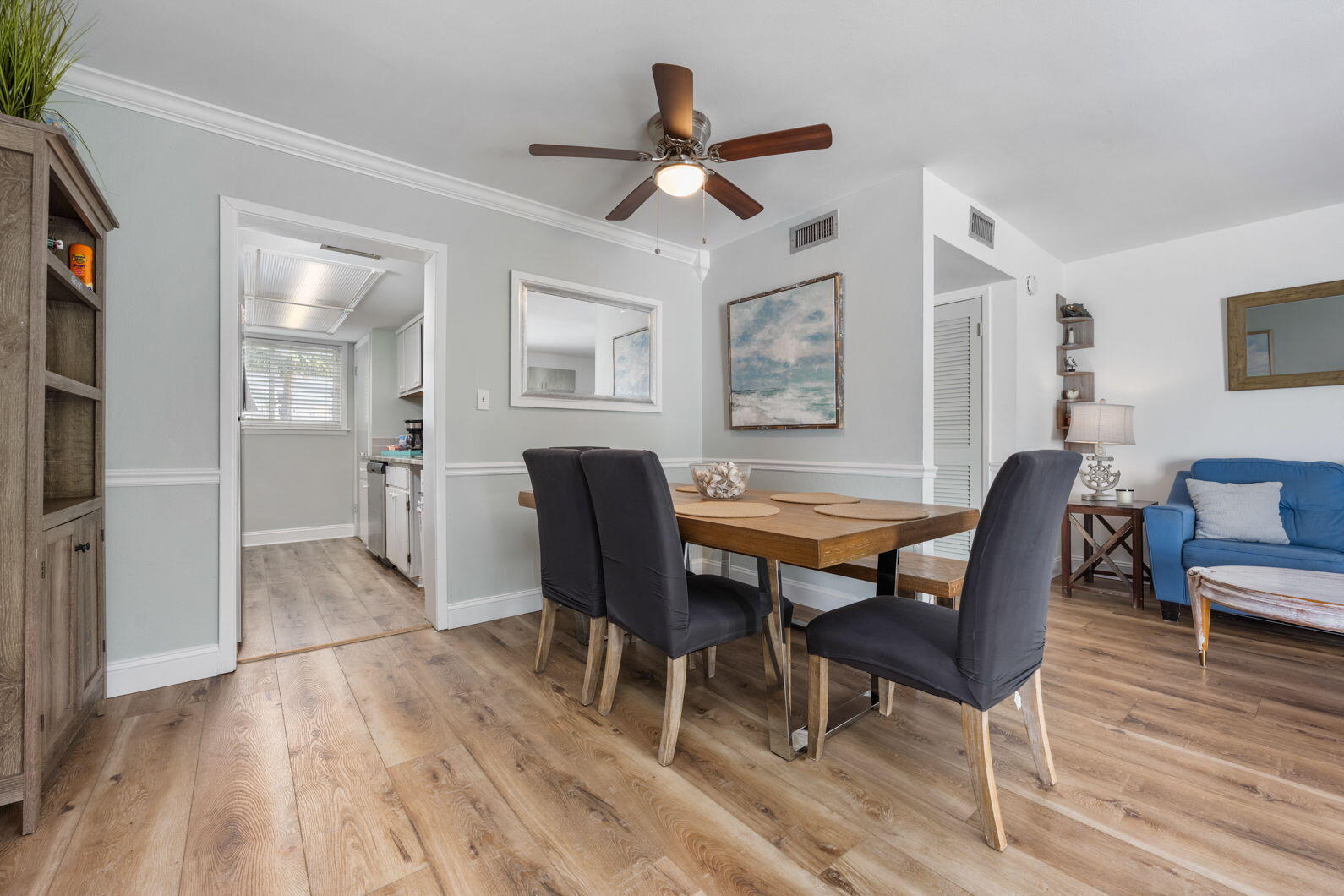 940 Highway 98, Unit 31 Destin, FL 32541 - Photo 10 of 36 a view of a dining room with furniture and wooden floor