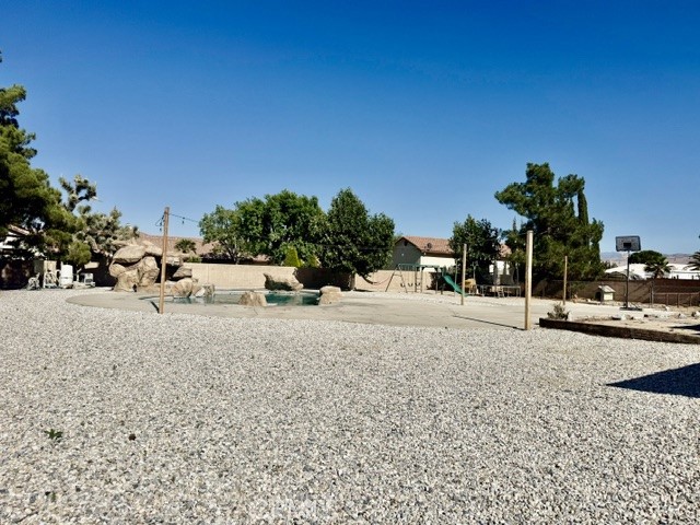 13375 Rincon Road Apple Valley, CA 92308 - Photo 55 of 72 Pool / Swing set