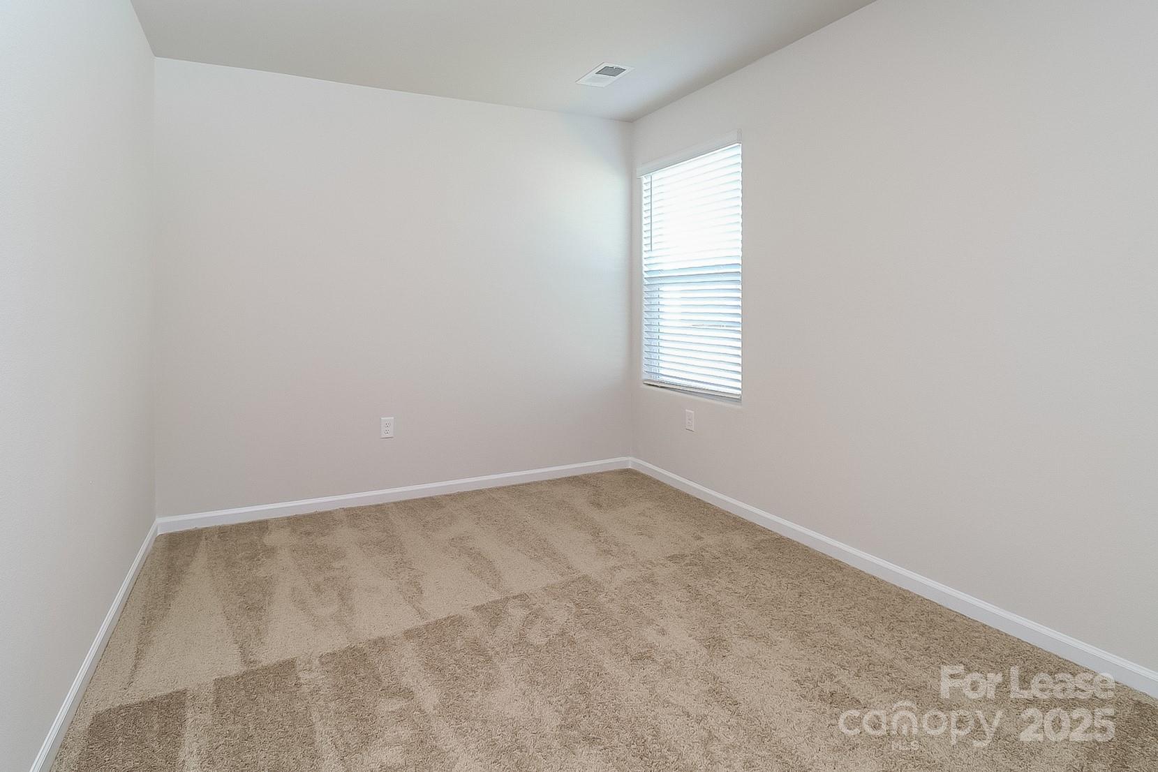 361 Kenyon Drive Kings Mountain, NC 28086 - Photo 12 of 16 an empty room with a window
