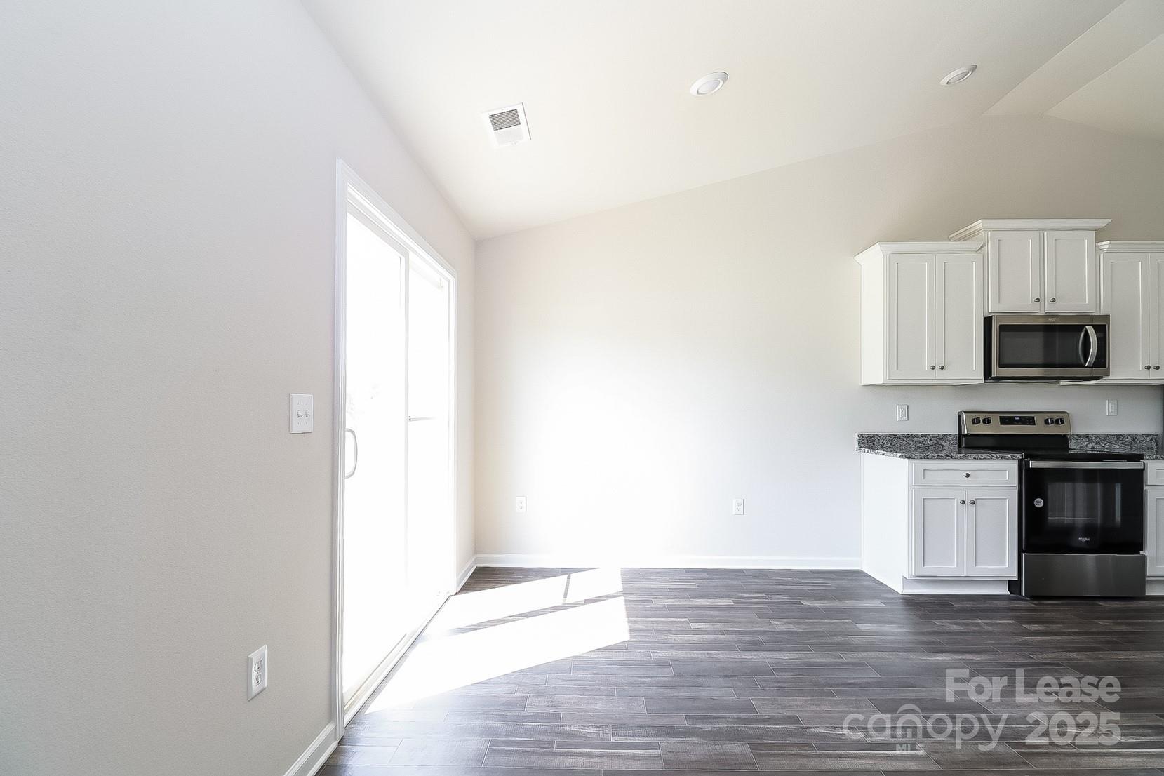 361 Kenyon Drive Kings Mountain, NC 28086 - Photo 6 of 16 a view of a kitchen with dishwasher and wooden floor