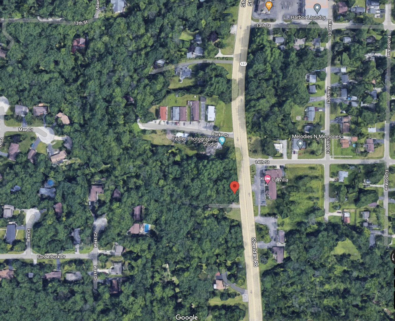 1400 Sheridan Road Winthrop Harbor, IL 60096 - Photo 10 of 10 an aerial view of residential house with outdoor space and trees all around