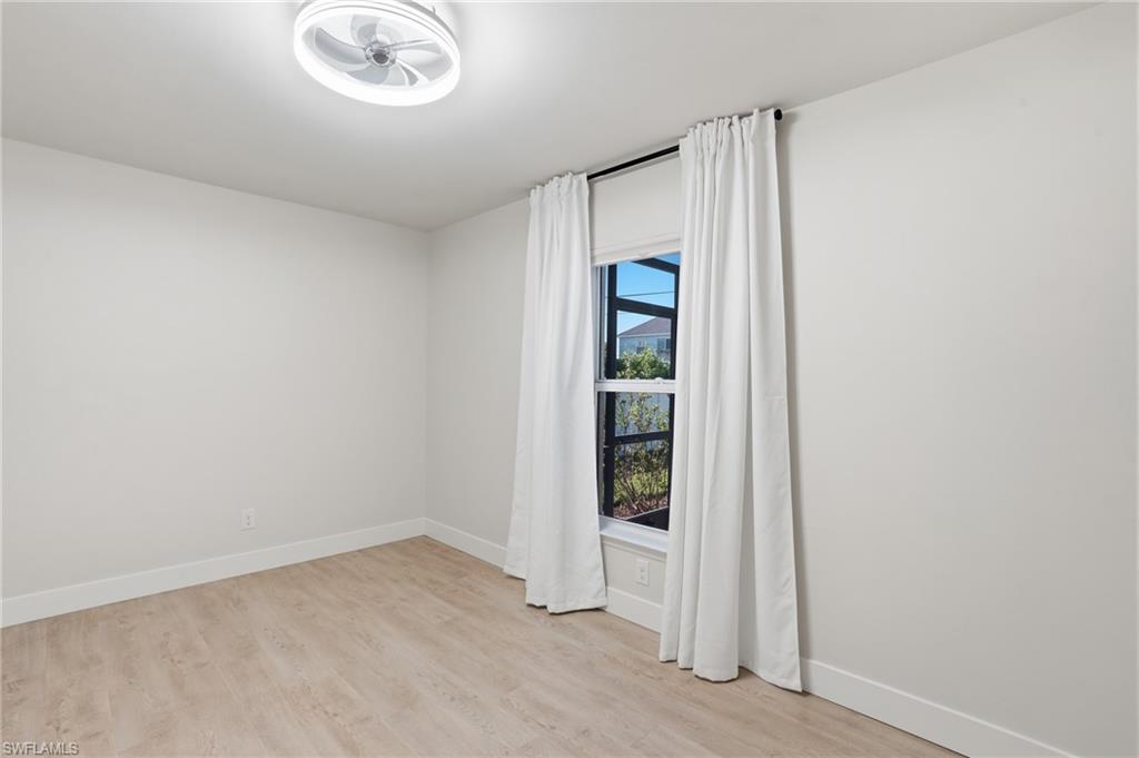 1808 Southwest 30th Street Cape Coral, FL 33914 - Photo 20 of 44 an empty room with window