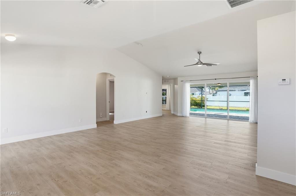 1808 Southwest 30th Street Cape Coral, FL 33914 - Photo 5 of 44 a view of an empty room with a window