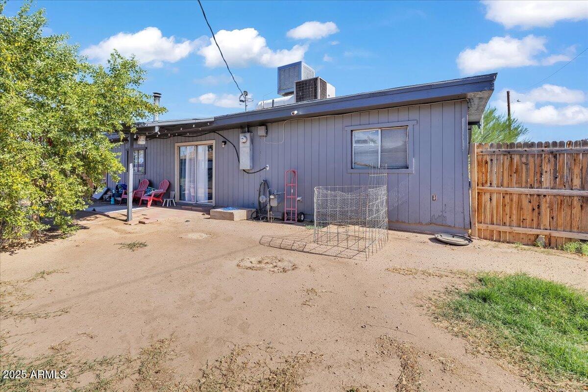 6516 West Cheery Lynn Road Phoenix, AZ 85033 - Photo 19 of 26 a view of large house with a patio