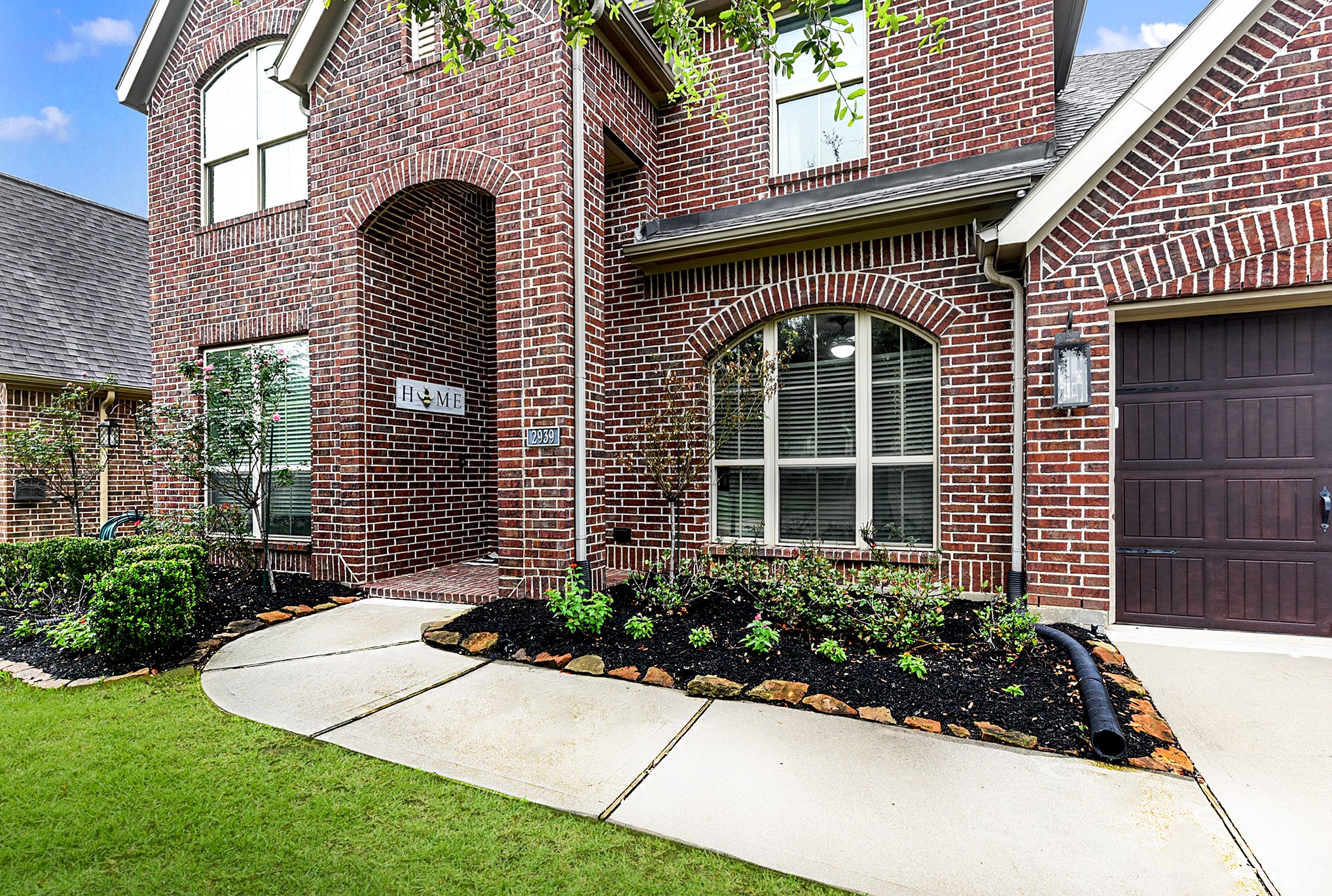 2939 Bobby Jones Road Katy, TX 77494 - Photo 5 of 50 a front view of a house with garden