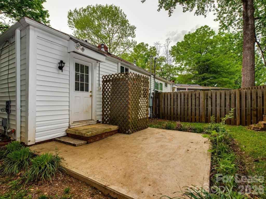 5113 Valley Stream Road Charlotte, NC 28209 - Photo 15 of 17 a backyard of a house