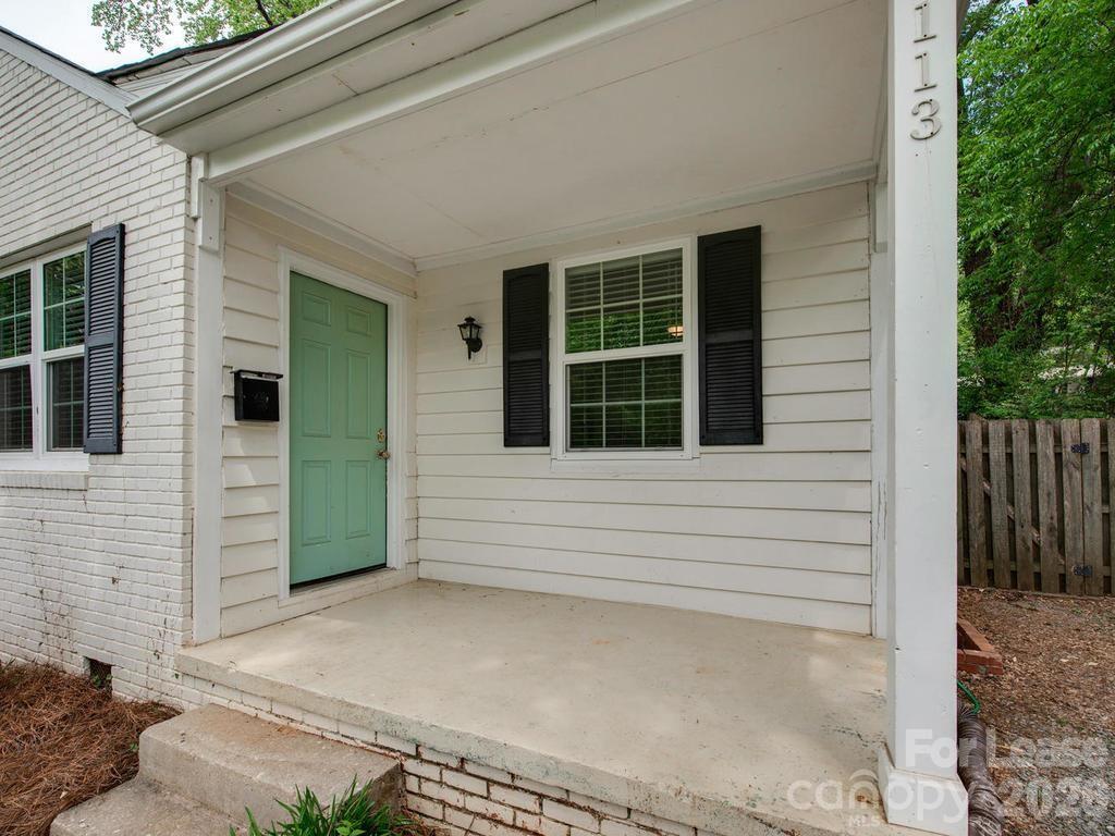 5113 Valley Stream Road Charlotte, NC 28209 - Photo 2 of 17 a view of a house with a large window