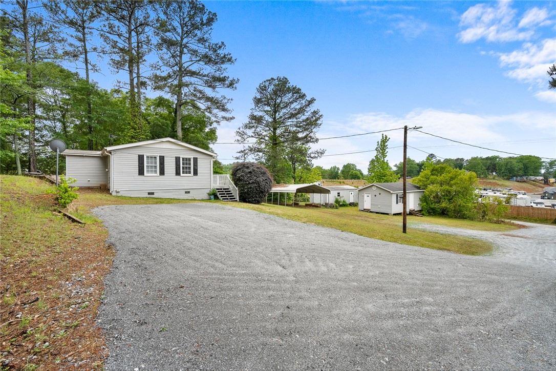 111 State Rd S-4-104 Anderson, SC 29626 - Photo 18 of 42 This charming residence offers a peaceful retreat with ample outdoor space.