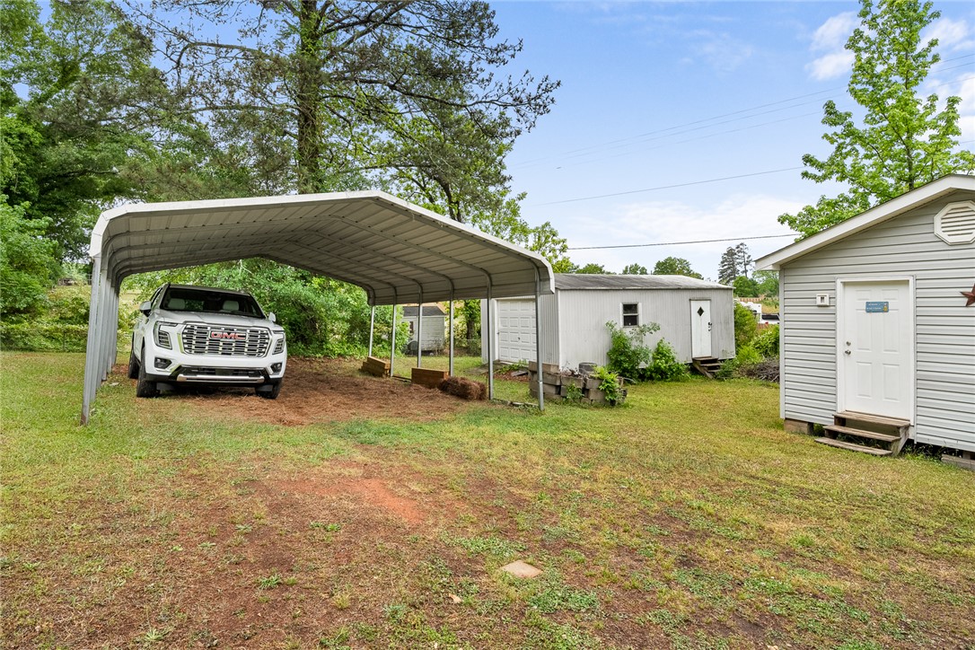 111 State Rd S-4-104 Anderson, SC 29626 - Photo 20 of 42 This property features ample storage solutions and convenient covered parking, ideal for various needs.